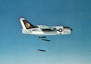 A-7E_VA-25_dropping_bombs_over_Vietnam_c1970
