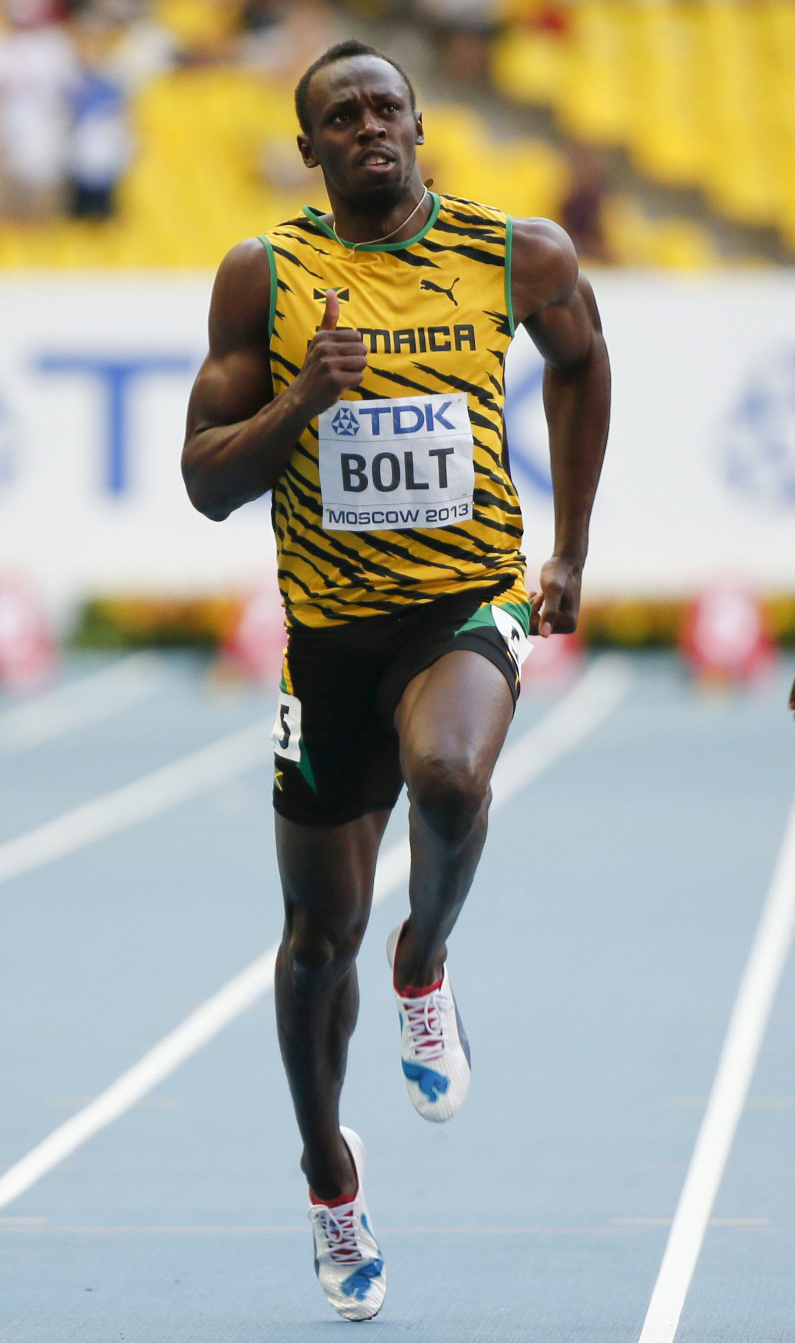 File photo of Bolt of Jamaica competing in the men's 100 metres semi-final heat event during the IAAF World Athletics Championships at the Luzhniki stadium in Moscow